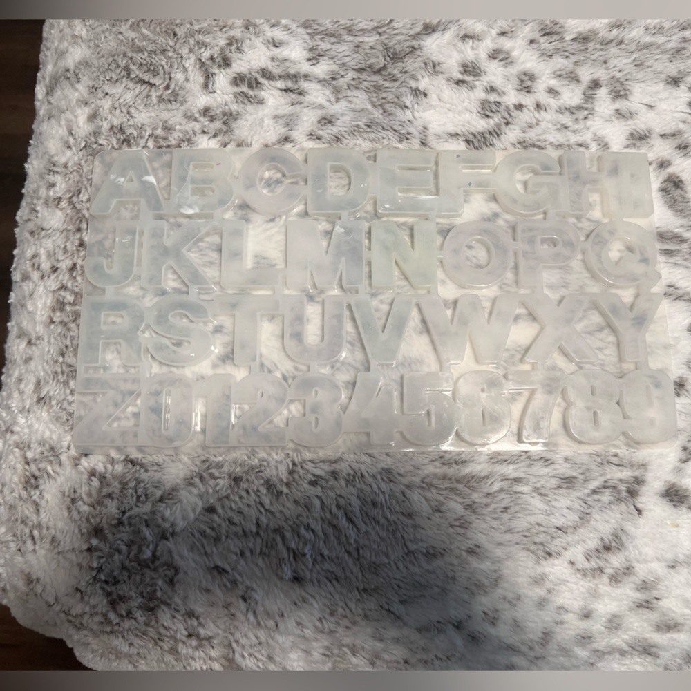 Rubber, number and letter mold.